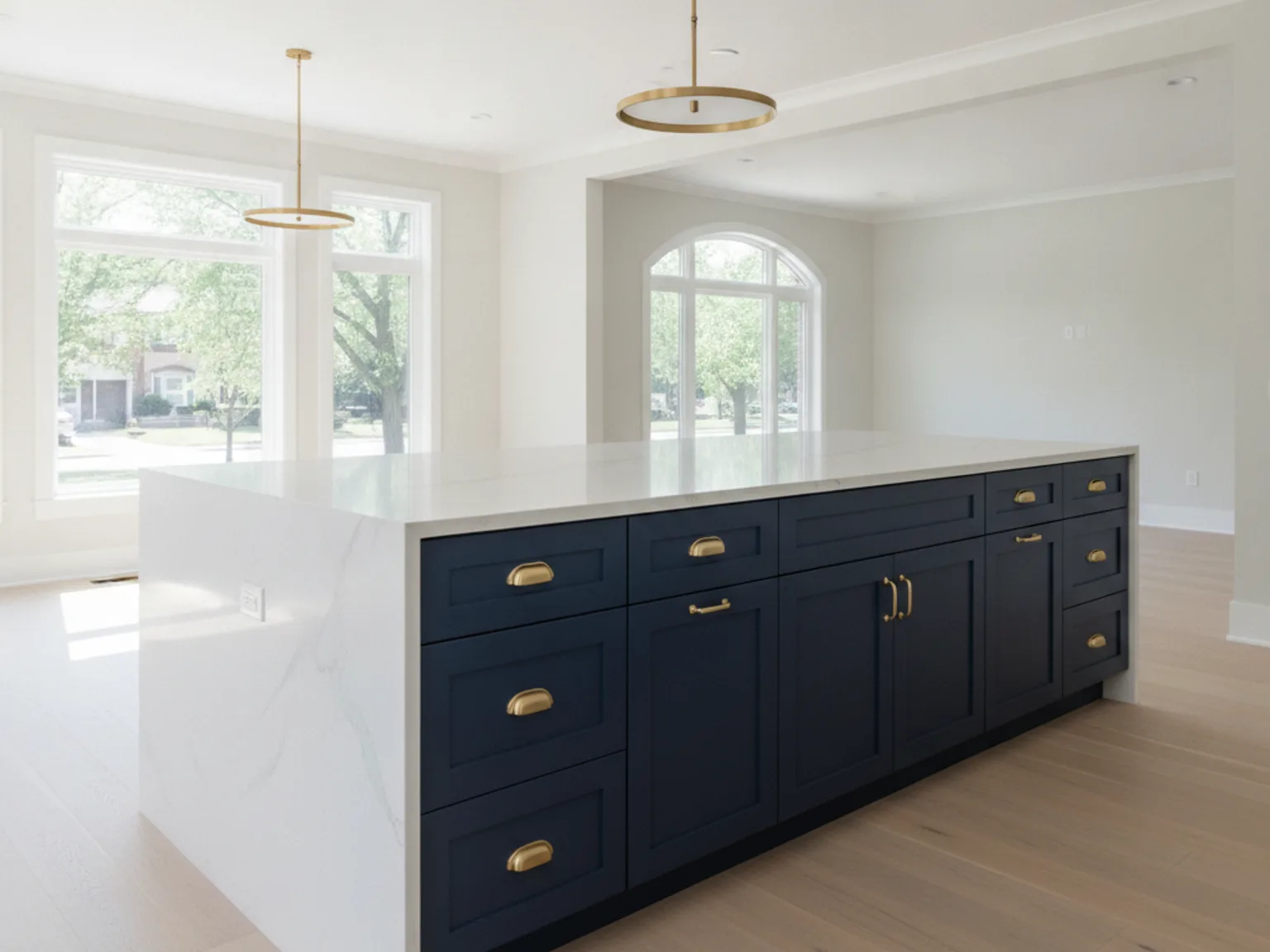 Two-tone kitchen with a navy blue island