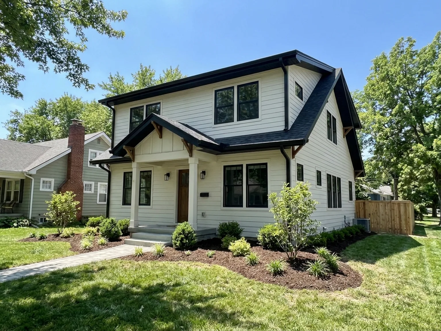 Kansas City home exterior with a completed second story addition and matching siding